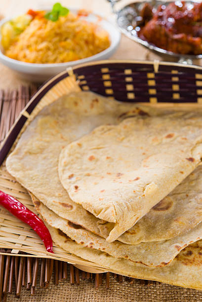 istock chapathi with various indian foods in traditional lifestyle 462172833