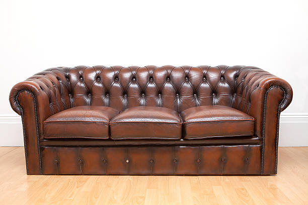 istock Brown Old Vintage genuine leather Sofa Texture Background 462185057