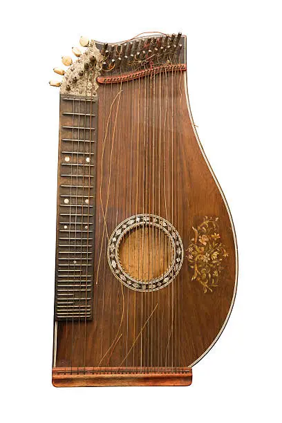 Zither-traditional a German musical instrument. The beginning of 19 centuries.Is isolated on the white