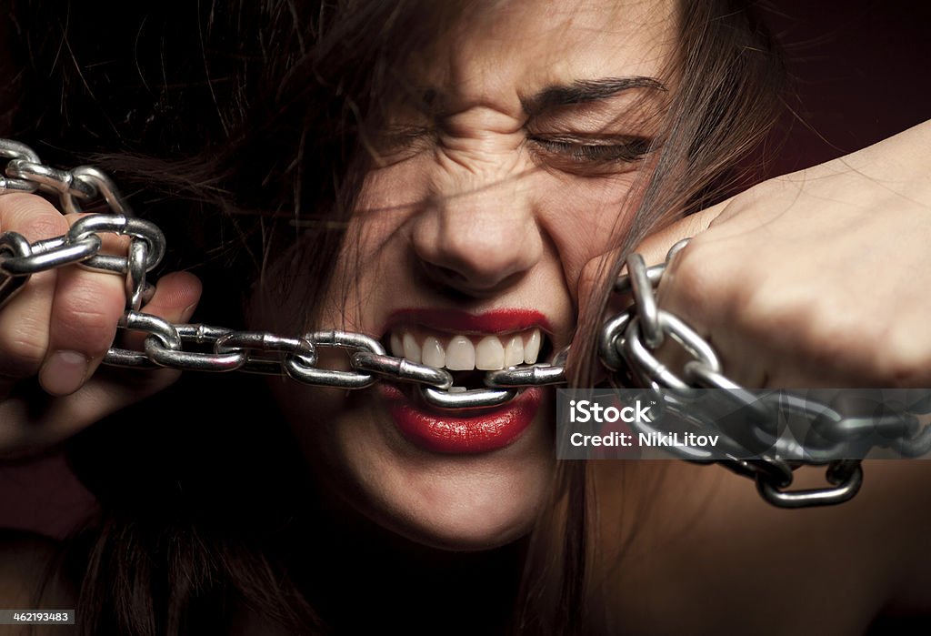 Healthy Teeth Close Up of Woman's Mouth with Chains Adolescence Stock Photo