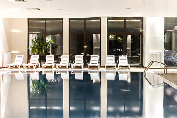 istock Luxury swimming pool in a modern hotel 462194639