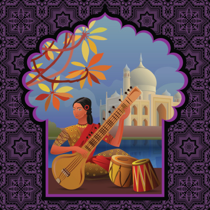 Indian girl playing sitar near Taj Mahal