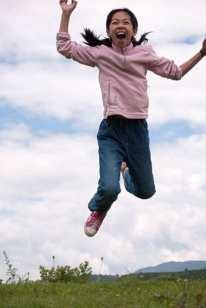 istock Asian girl jumping 462198705