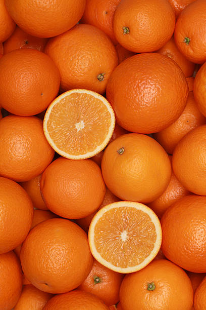 istock Oranges forming a fruits background 462202035