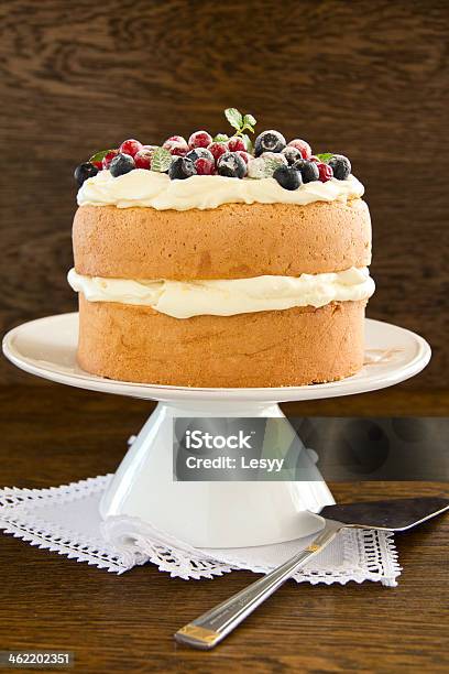 Sponge Cake With Whipped Cream And Fresh Berries Stock Photo - Download Image Now - Baked Pastry Item, Baking, Berry Fruit