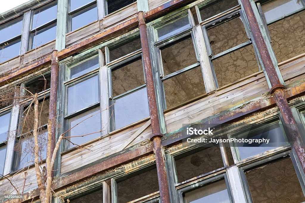 broken windows at the abandoned building Hospital Stock Photo