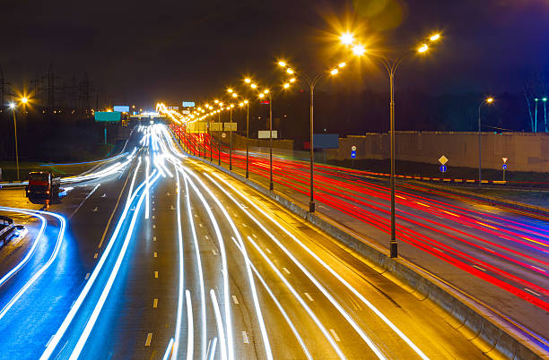 istock traffic on the highway at night 462206071