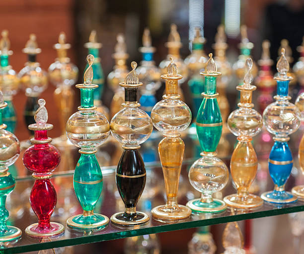 istock Ornate perfume bottles on a shelf 462209597