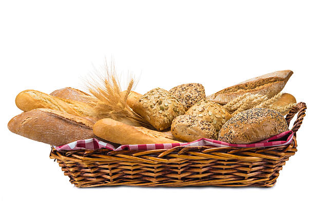 istock Basket with a bread assortment isolated on white 462216817