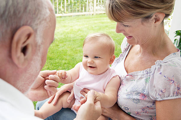 istock Grandparents Playing With Granddaughter 462221539