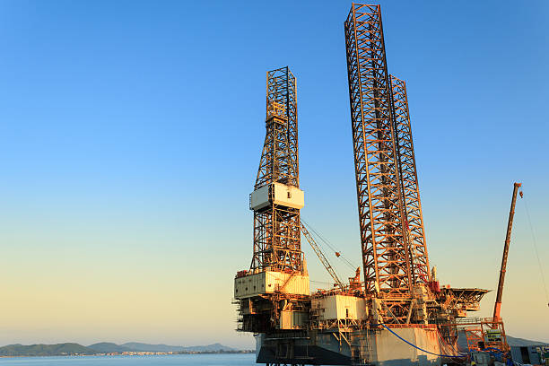 istock Jack up oil drilling rig in the shipyard 462223423