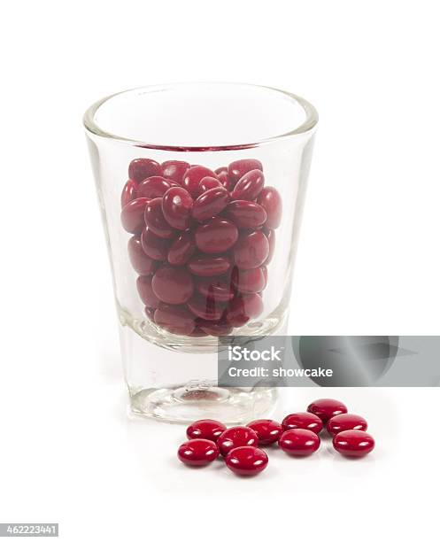 Red Pills And Pill Bottle On White Stock Photo - Download Image Now - Acetylsalicylic Acid, Addiction, Antibiotic