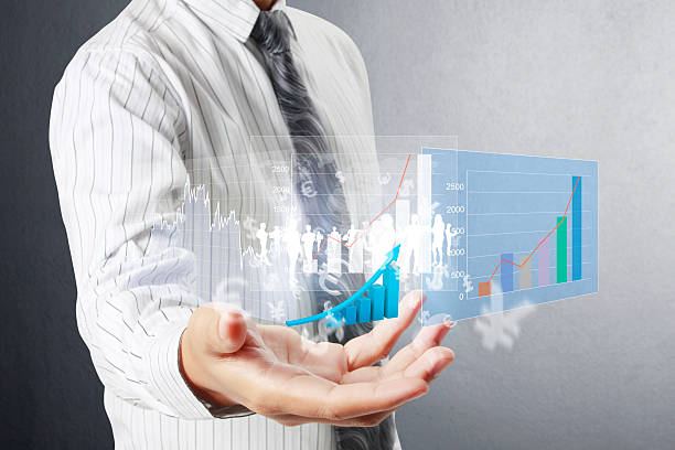 istock financial symbols coming from hand 462232571