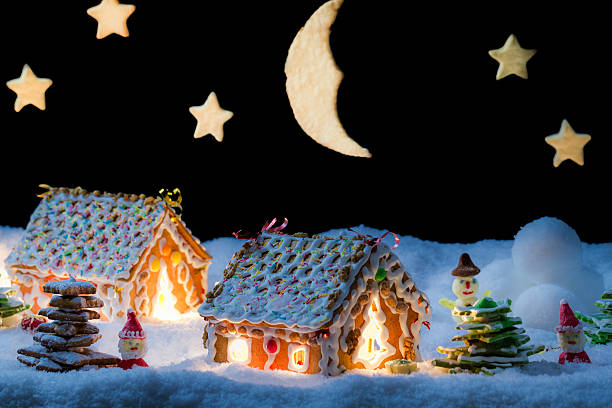 istock Gingerbread home with snowman and santa 462238691
