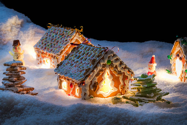 istock Small gingerbread cottage in winter at night 462238729