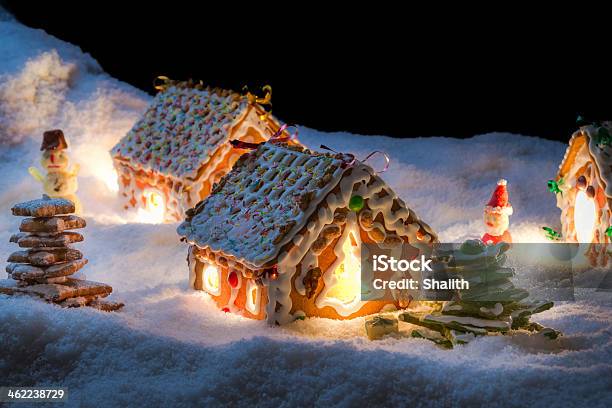 Small Gingerbread Cottage In Winter At Night Stock Photo - Download Image Now - Gingerbread Cake, Gingerbread Cookie, Village