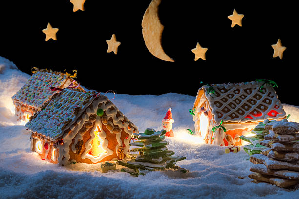 istock Snowy gingerbread village with stars 462239103