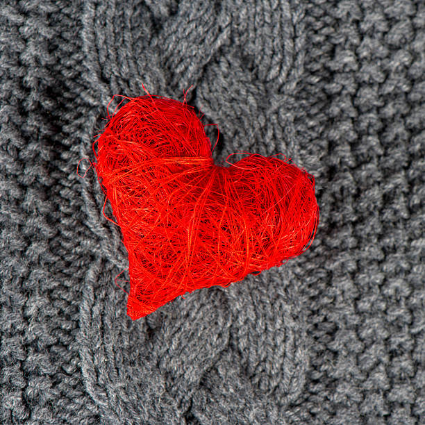 istock red heart of knitted wool background 462244107