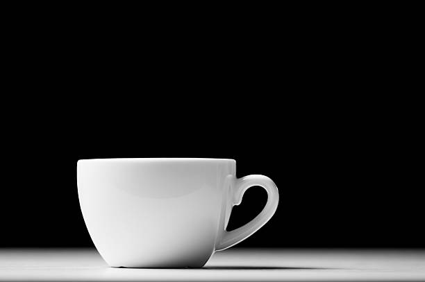 istock Defocused lights as aroma emanates from white coffee cup 462244799