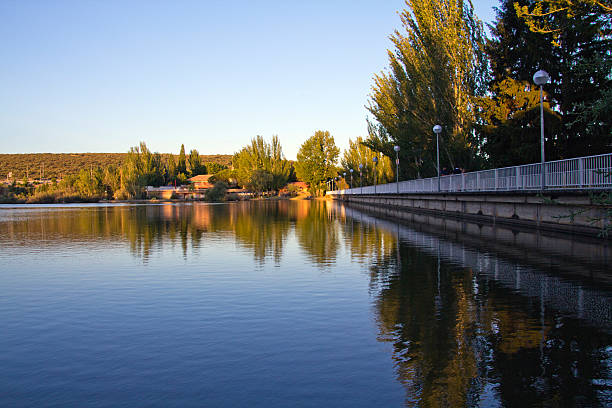 istock calm lake waters at sunset 462246545