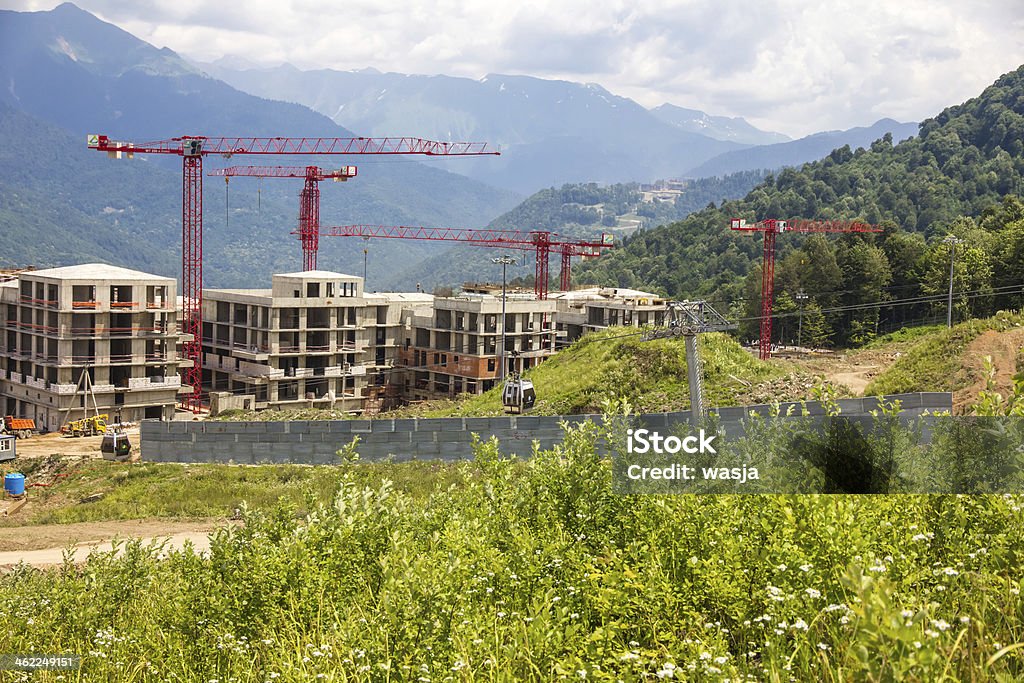 Building in the mountains Construction Industry Stock Photo