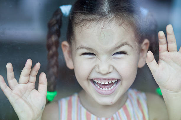 istock Asian girl at the window 462251793