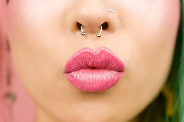 istock Young woman puckering her lips 462252021