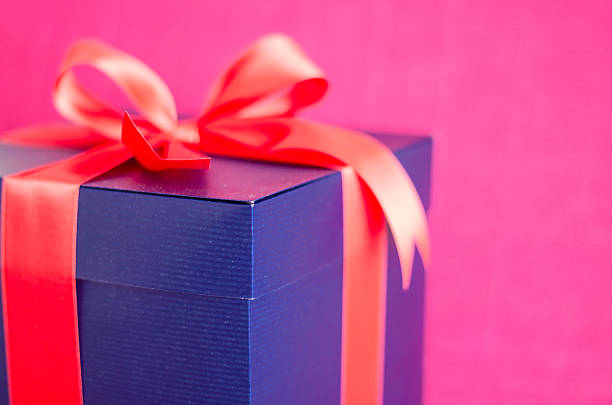 present box with red ribbon stock photo