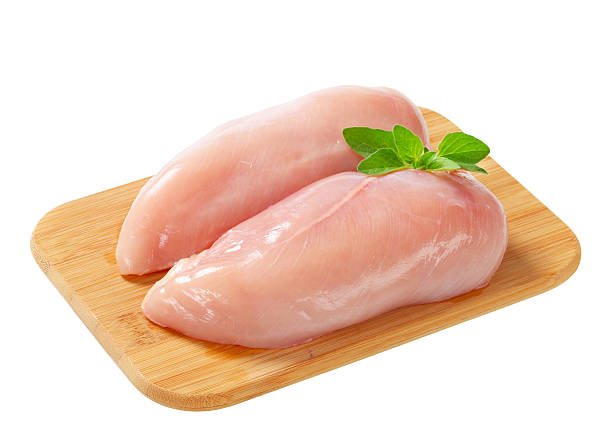 Raw chicken breast fillets stock photo