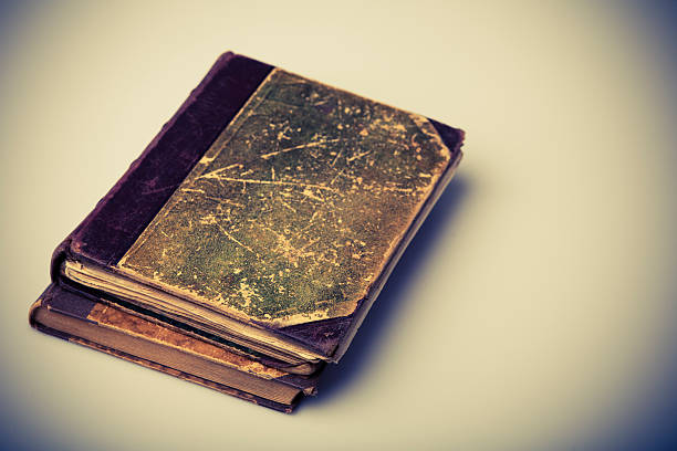 istock Beautiful old two books closeup on white background 462262319
