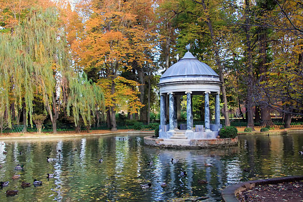istock fall in a lake with marble temple 462267201