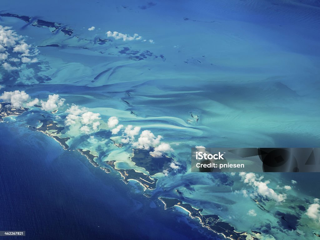 Aerial view of Caribbean islands chain Aerial view of Caribbean islands chain creating a blue desert-like contour Aerial View Stock Photo