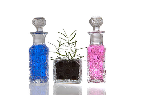 Blue pink crystal glass bottles stock photo