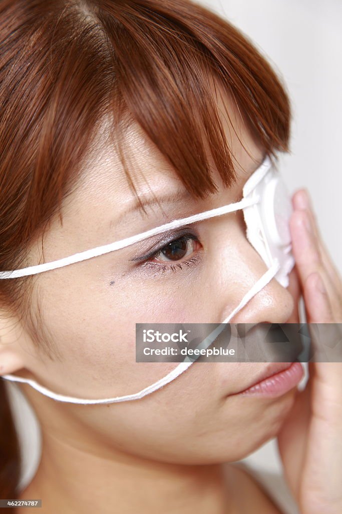 woman with the eyepatch close up shot of woman with the eyepatch Adult Stock Photo