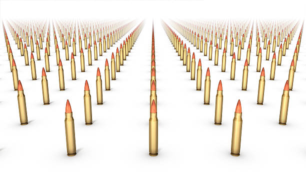 Diagonal high angle view of rifle bullets stock photo