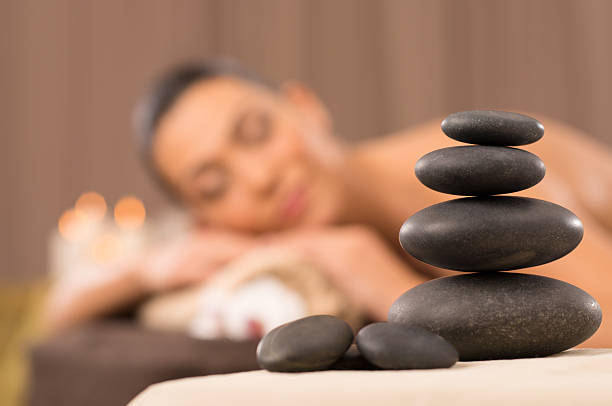 Pile Of Hot Stones Stone Massage Set hot stone massage stock pictures, royalty-free photos & images