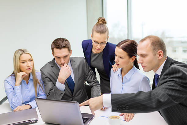 istock business team with laptop having discussion 462276031