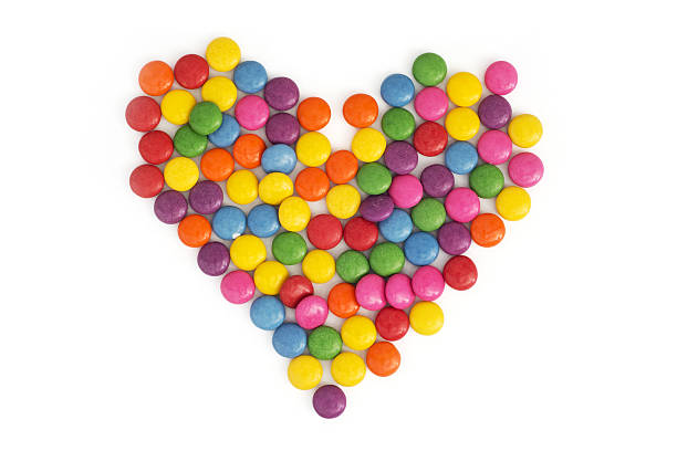 20+ Nestle Smarties Candy Love Heart Shape Stock Photos, Pictures ...