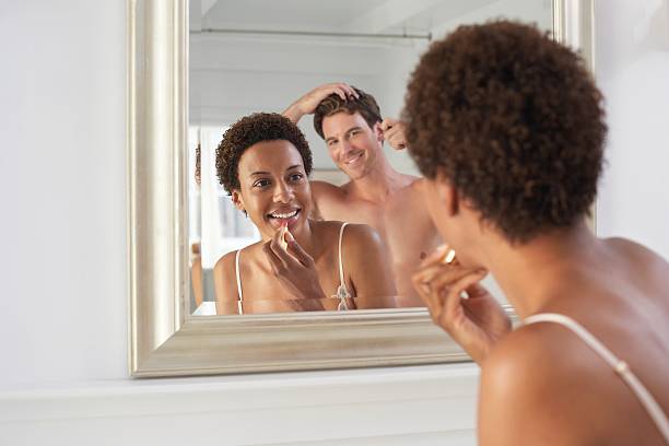 istock Happy multi ethnic couple getting ready in bathroom 462280735