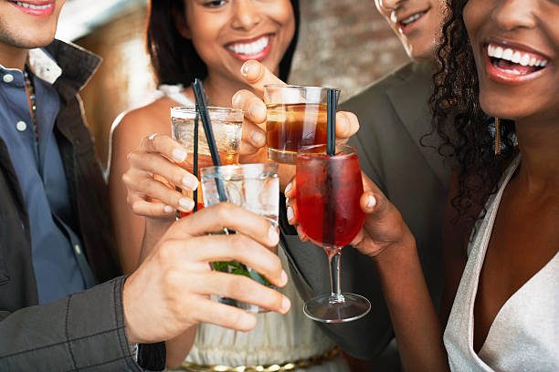 istock Closeup Of Toasting Drinks At Bar 462281679