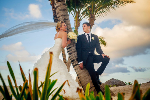 Bride and groom, tropical beach wedding.