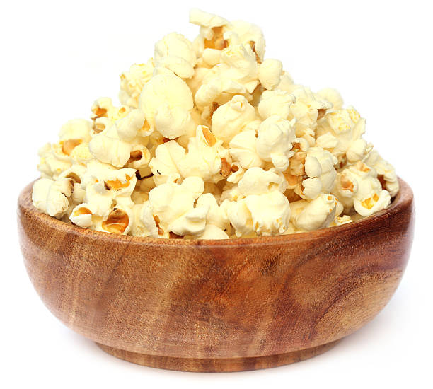istock Popcorns on wooden bowl 462296239