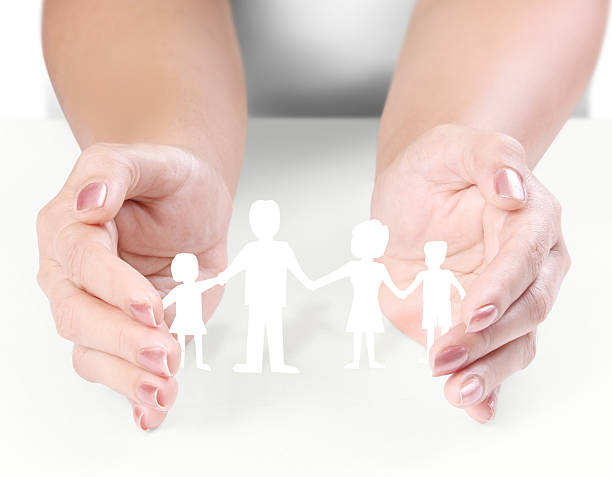 istock ideas,paper family in  hand 462296559