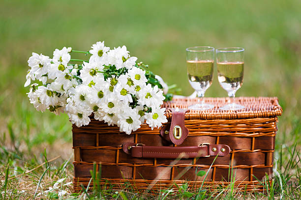 istock glasses of wine and flowers 462297595