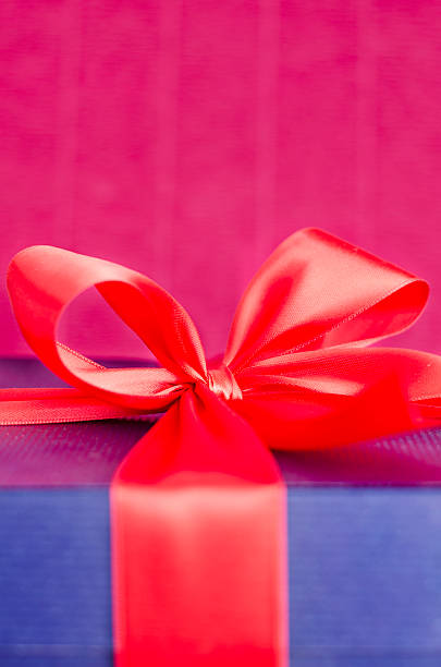present box with red ribbon stock photo