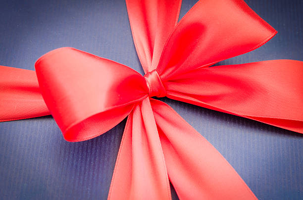 present box with red ribbon stock photo