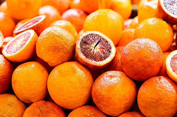 istock Blood oranges on market stand 462303933