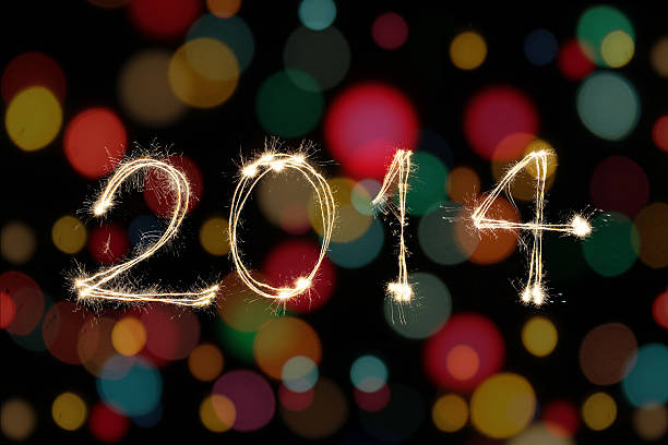 istock New year's 2014 with colorful bokeh background 462304037