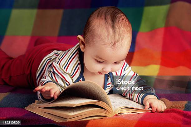 Cute Little Baby Reading Book Stock Photo - Download Image Now - Baby - Human Age, Book, Reading