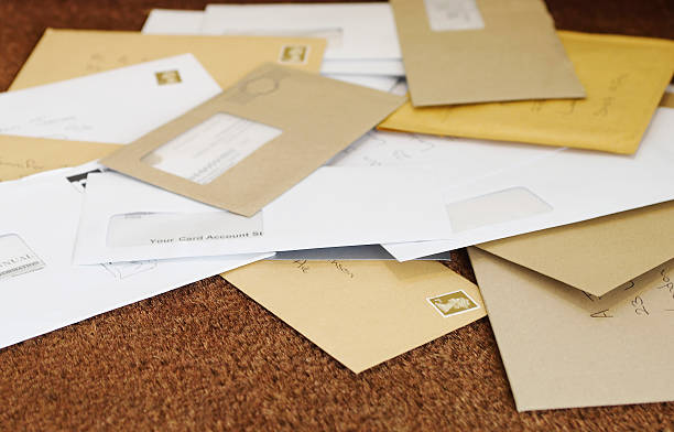 istock Pile Of Mail On Doormat 462310603
